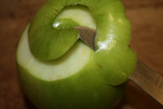 Peeling apple 