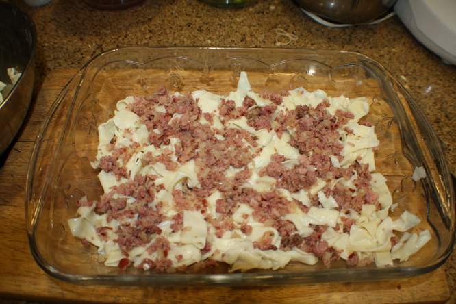 first layer of ham and noodles