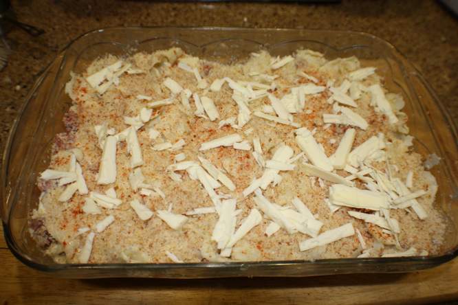 Bread crumb topping and topped with butter. 