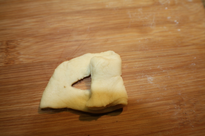 Pull one end of the Grebble through 