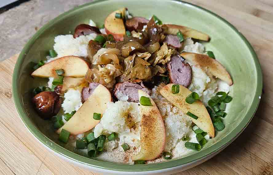 Himmel und Erde topped with the apples and onions sauteed together