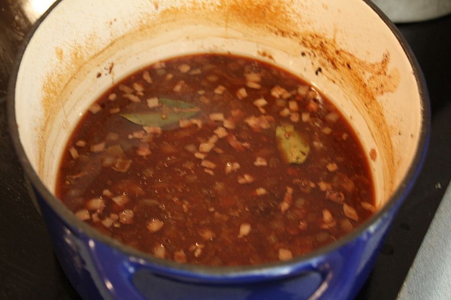 Pan juices and onions used to make rouladen gravy