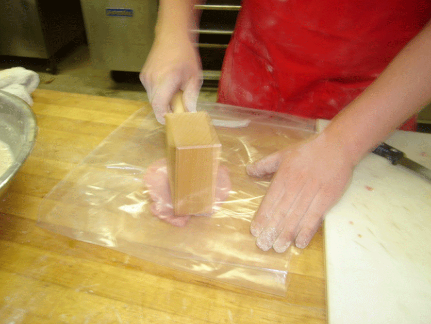 Pounding the cutlet to 1/4 inch about. 