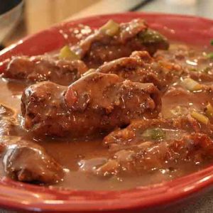 German rouladen beef rolls in rich brown gravy ready to serve