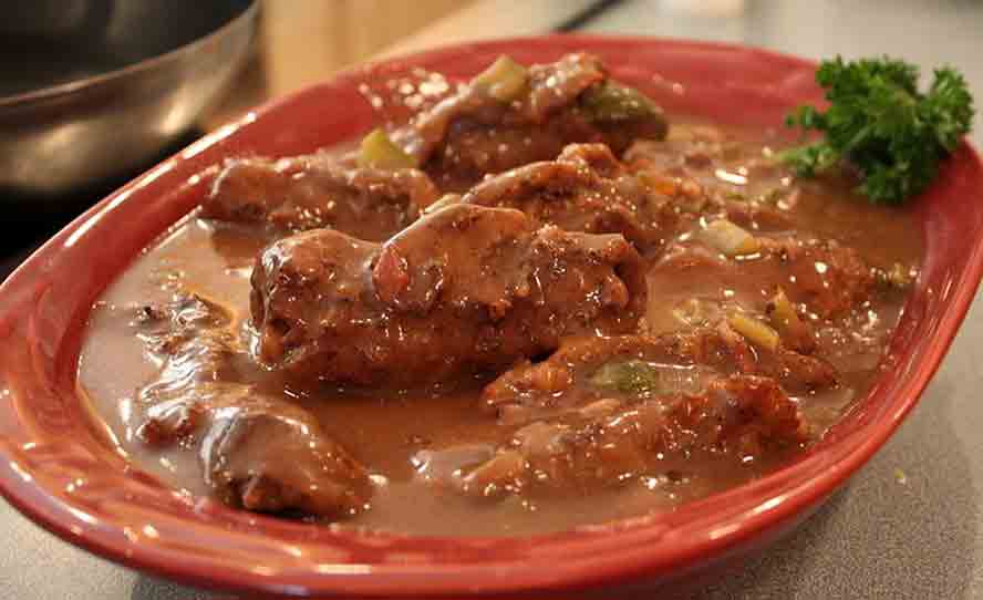 German rouladen beef rolls in rich brown gravy ready to serve