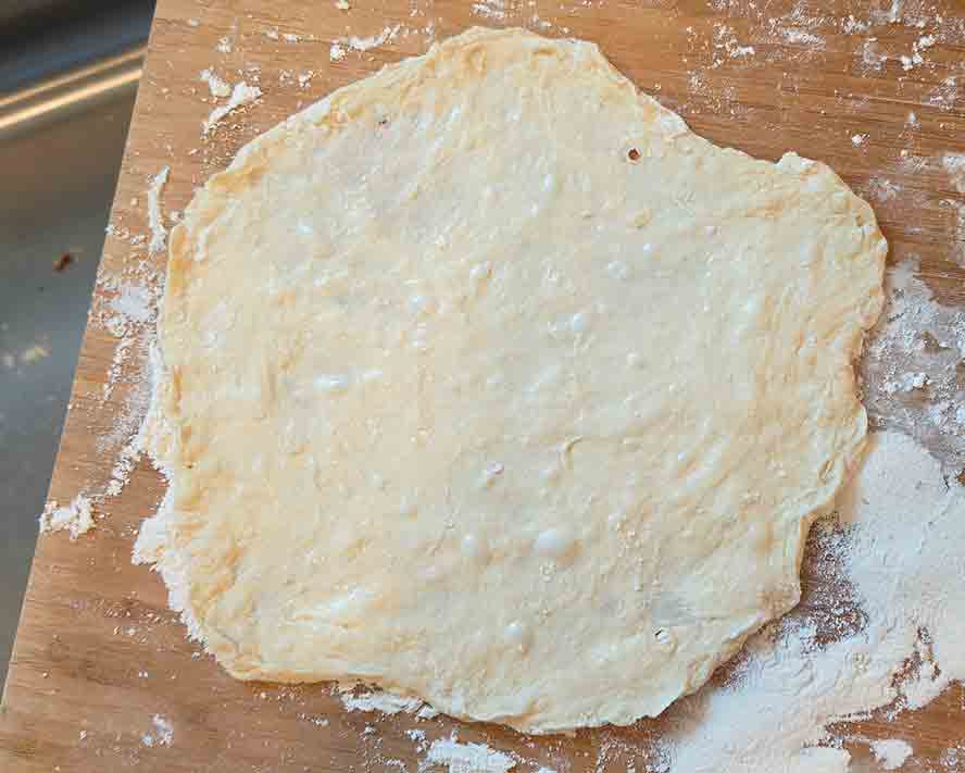 dough-stretched stretching the dough