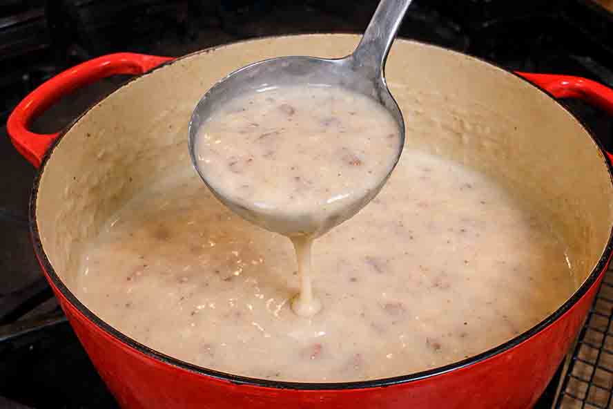 Creamy bacon gravy finished and ready to serve with the schnitzel.