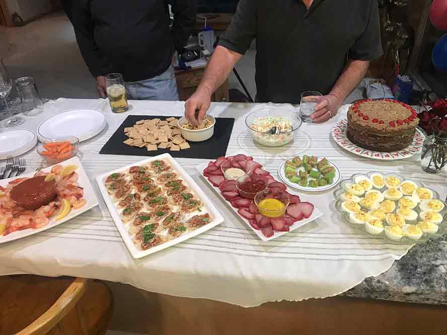 Full buffet table for birthdday with German Chocolate Cake.