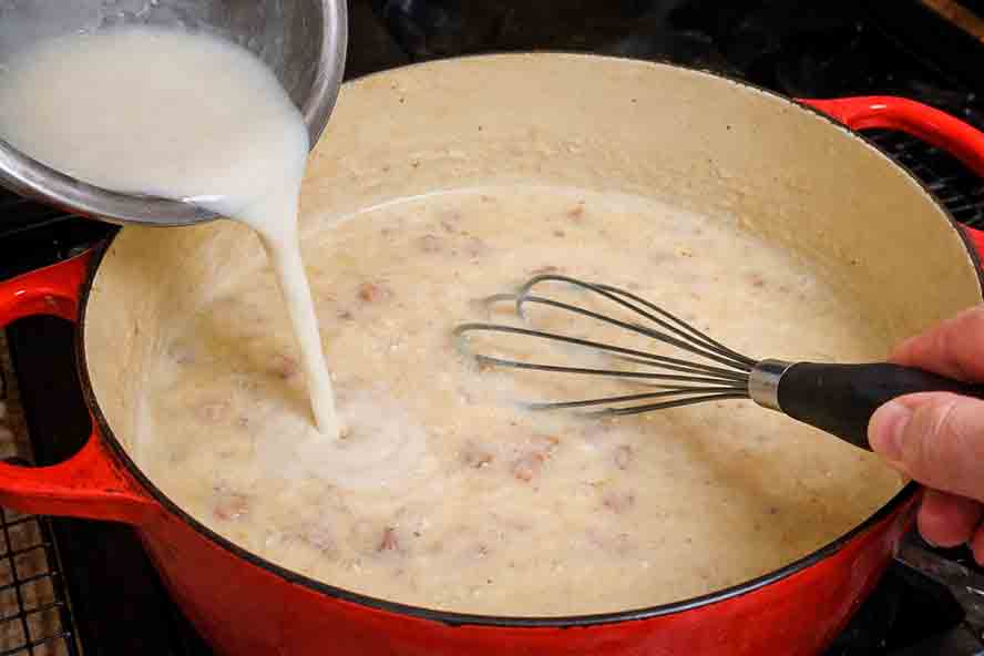 Add milk to the gravy 